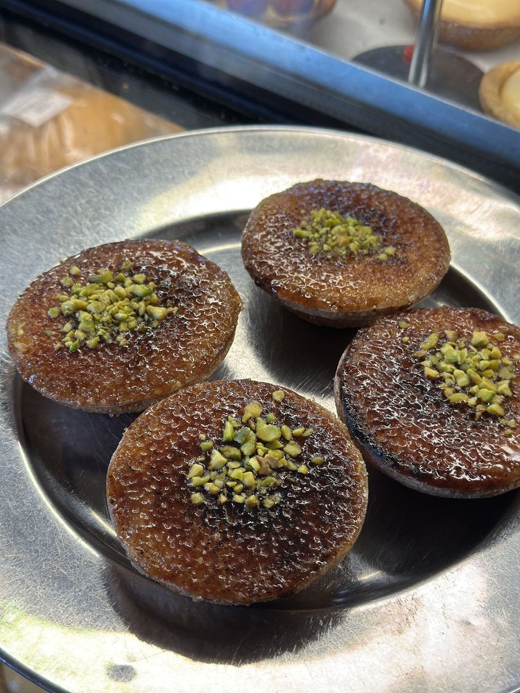 Pistachio-topped pastries at a Surry Hills bakery