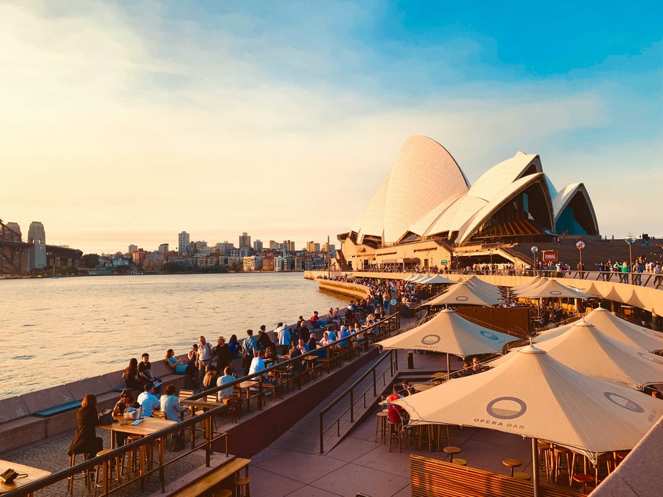 Sydney Opera House and Opera Bar at sunset